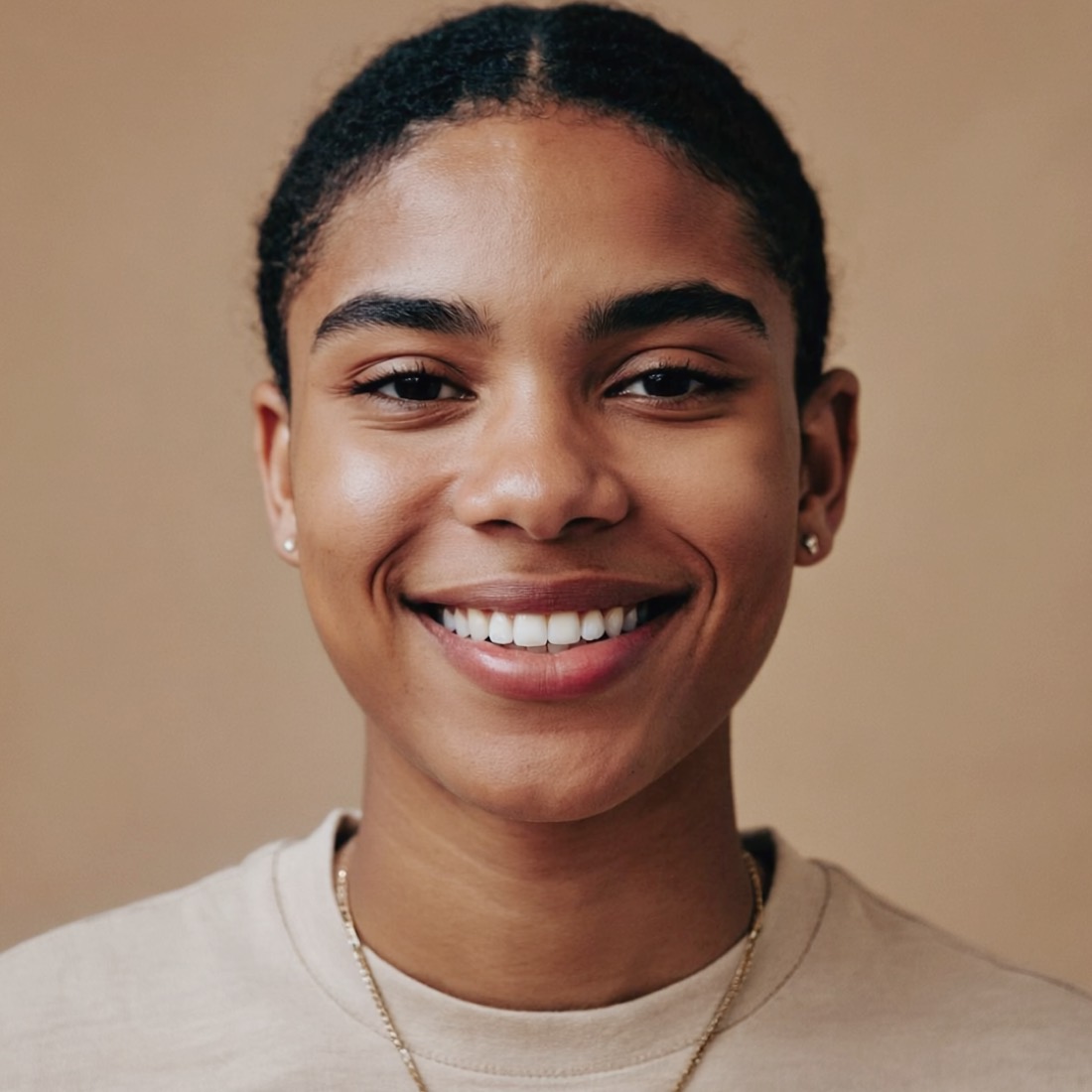 A simulated smile change shown on a generated face